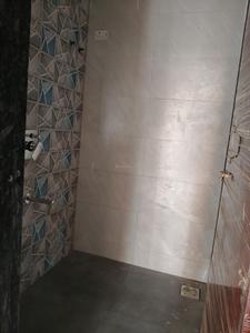 Common Bathroom Image of 672 Sq.ft 1 BHK Apartment / Flat for sale in Pushpak Nagar Navi Mumbai for Rs. 4320000