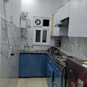 Kitchen Image of 700 Sq.ft 2 BHK Builder Floor for rent in Sector 19 Dwarka New Delhi for Rs. 30000