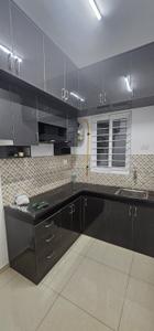 Kitchen Image of 700 Sq.ft 2 BHK Apartment / Flat for rent in Urbanrise Revolution One, Padur Chennai for Rs. 23000