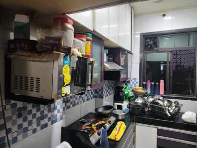 Kitchen Image of 530 Sq.ft 1 BHK Apartment / Flat for rent in Vihang Valley, Kasarvadavali Thane for Rs. 19000