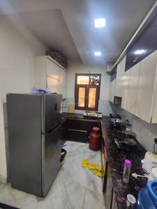 Kitchen Image of 900 Sq.ft 3 BHK Builder Floor for rent in Sector 24 Rohini New Delhi for Rs. 25000