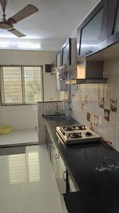 Kitchen Image of 1160 Sq.ft 2 BHK Apartment / Flat for rent in Pramukh Gardens, Park City Silvassa for Rs. 23500