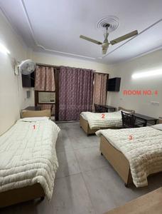 Bedroom Image of Juneja &amp; Royal Stay PG in Lajpat Nagar, New Delhi
