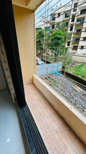 Balcony Image of 555 Sq.ft 1 BHK Apartment / Flat for sale in Varad Parijatak Phase I A And B Wing, Badlapur East Badlapur for Rs. 2499000