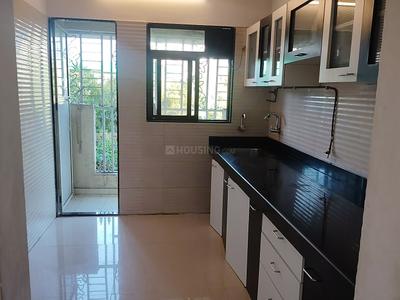 Kitchen Image of 970 Sq.ft 2 BHK Apartment / Flat for rent in Cosmos Jewels, Thane West Thane for Rs. 35000