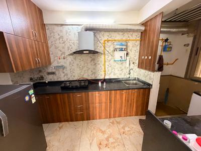 Kitchen Image of 1305 Sq.ft 2 BHK Apartment / Flat for rent in Swagat Queens Land, Sargasan Gandhinagar for Rs. 27000