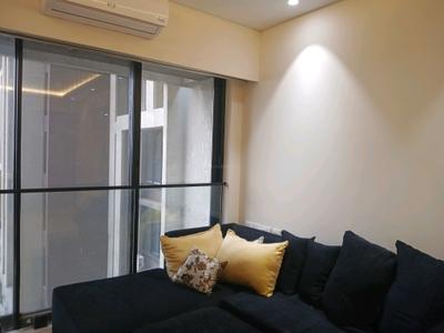 Living Room Image of 810 Sq.ft 1 BHK Apartment / Flat for rent in Earth Anand, Mandvi Mumbai for Rs. 55000