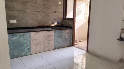 Kitchen Image of 810 Sq.ft 2 BHK Apartment / Flat for sale in Akshar Tilak Arise, Sargasan Gandhinagar for Rs. 6250000