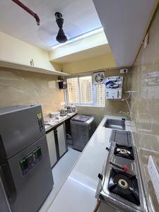 Kitchen Image of Homtal PG in Ghatkopar East, Mumbai