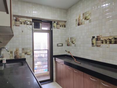 Kitchen Image of 950 Sq.ft 2 BHK Apartment / Flat for sale in Lotus Sky Garden, Malad West Mumbai for Rs. 23500000
