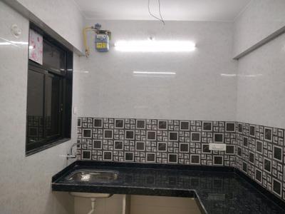 Kitchen Image of 700 Sq.ft 1 BHK Apartment / Flat for rent in Raunak Unnathi Greens, Kasarvadavali Thane for Rs. 16423