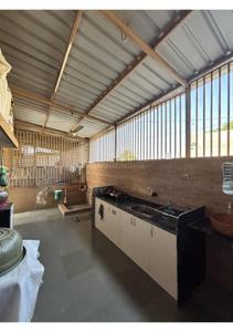 Kitchen Image of 3015 Sq.ft 4 BHK Independent House for sale in Akash Grand City, Enasan Ahmedabad for Rs. 27500000
