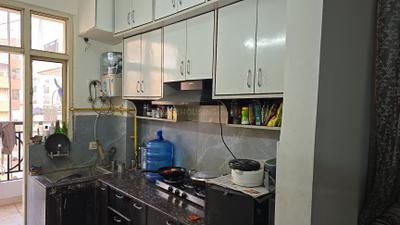 Kitchen Image of 1075 Sq.ft 2 BHK Apartment / Flat for rent in Gardenia Square, Crossings Republik Ghaziabad for Rs. 24000