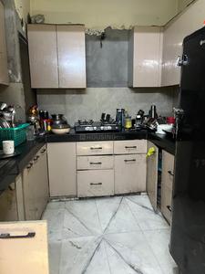 Kitchen Image of 950 Sq.ft 2 BHK Builder Floor for rent in Janakpuri New Delhi for Rs. 28000