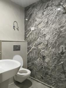Common Bathroom Image of 1050 Sq.ft 2 BHK Apartment / Flat for sale in Vihaan Wardania, Noida Extension Greater Noida for Rs. 4600000