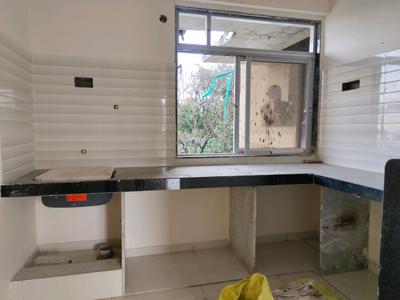 Kitchen Image of 900 Sq.ft 2 BHK Apartment / Flat for sale in Rajaram Shivam Enclave, Shilphata Thane for Rs. 5800000