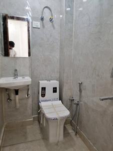 Common Bathroom Image of 550 Sq.ft 2 BHK Apartment / Flat for sale in Dwarka Mor New Delhi for Rs. 3950001