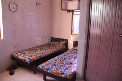 Bedroom Image of Economy PG @ Prime Location  in Ghatlodiya, Ahmedabad