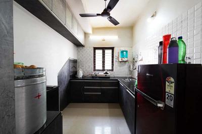 Kitchen Image of 1305 Sq.ft 3 BHK Independent House for sale in Aaditya Pimpan 101 Green Homes, Pipan Ahmedabad for Rs. 9950000