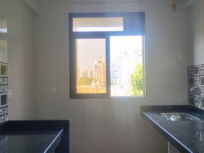 Kitchen Image of 690 Sq.ft 1 BHK Apartment / Flat for sale in Saras Residency, Thakurli Thane for Rs. 4347000