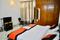 Bedroom Image of Madhuraj Hotels in Sector 51, Noida