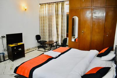 Bedroom Image of Madhuraj Hotels in Sector 51, Noida