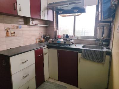 Kitchen Image of 980 Sq.ft 2 BHK Apartment / Flat for sale in Airport Gate no. 1 Kolkata for Rs. 4200000