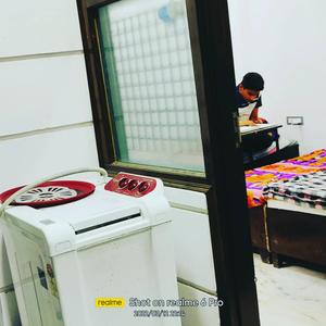 Bedroom Image of Aaru P.G. in Mukherjee Nagar, New Delhi