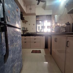 Kitchen Image of 600 Sq.ft 2 BHK Apartment / Flat for sale in Kashish Park, Dharamveer Nagar Thane for Rs. 10000000