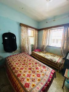 Bedroom Image of Home for PG Boys in Vile Parle West, Mumbai