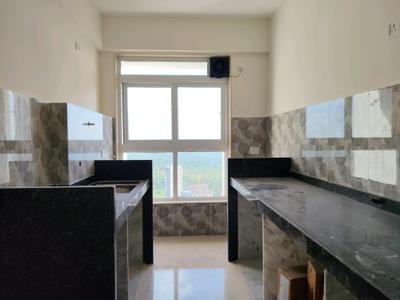 Kitchen Image of 997 Sq.ft 2 BHK Apartment / Flat for rent in Dynamix Divum, Malad East Mumbai for Rs. 70000