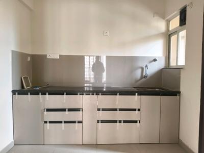 Kitchen Image of 935 Sq.ft 2 BHK Apartment / Flat for sale in Puraniks Abitante Fiore, Bavdhan Pune for Rs. 8300000