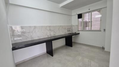 Kitchen Image of 800 Sq.ft 2 BHK Apartment / Flat for sale in Gulmohar Sky Park, Dhanori Pune for Rs. 6500000