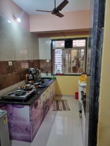 Kitchen Image of 700 Sq.ft 1 BHK Apartment / Flat for sale in Thakurli Thane for Rs. 5800000