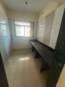 Kitchen Image of 980 Sq.ft 2 BHK Apartment / Flat for rent in Mohan Willows I, Badlapur East Badlapur for Rs. 11500