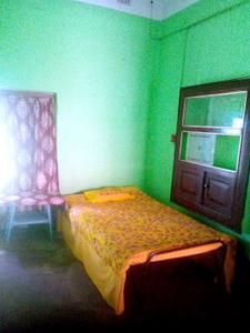 Bedroom Image of Das Pg for boys in Madhyamgram, Kolkata