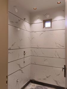 Common Bathroom Image of 540 Sq.ft 2 BHK Apartment / Flat for sale in Sector 24 Rohini New Delhi for Rs. 4100000