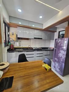 Kitchen Image of 1500 Sq.ft 2 BHK Apartment / Flat for sale in Sarjan Setu Altezza, Tragad Ahmedabad for Rs. 7000000