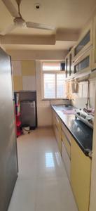 Kitchen Image of 650 Sq.ft 1 BHK Apartment / Flat for rent in Puranik City Phase 3, Thane West Thane for Rs. 26999