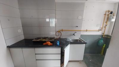 Kitchen Image of 400 Sq.ft 1 BHK Apartment / Flat for rent in Savvy Studioz, Gota Ahmedabad for Rs. 15500