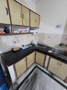 Kitchen Image of 380 Sq.ft 1 RK Builder Floor for rent in Old Double Storey, Lajpat Nagar New Delhi for Rs. 16000