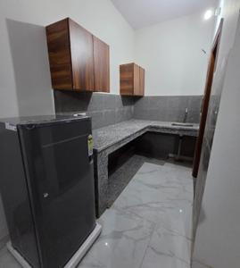 Kitchen Image of 450 Sq.ft 1 RK Studio for rent in Sector 10A Gurgaon for Rs. 17000