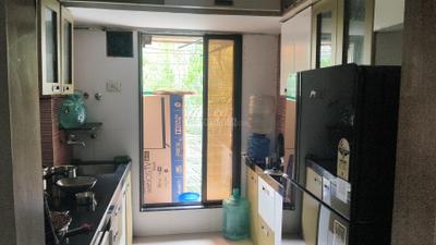 Kitchen Image of 620 Sq.ft 1 BHK Apartment / Flat for sale in Mira Road East Mira Bhayandar for Rs. 7900000