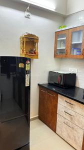 Kitchen Image of 850 Sq.ft 1 BHK Apartment / Flat for rent in Applewoods Satyesh Residency, Shela Ahmedabad for Rs. 21500