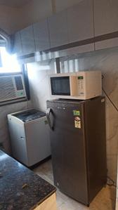 Kitchen Image of 367 Sq.ft 1 RK Studio for rent in DLF Capital Green III, Karampura New Delhi for Rs. 22000