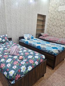 Bedroom Image of aarti pg in Shakti Nagar, New Delhi