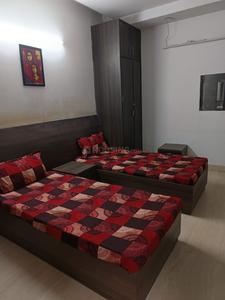 Bedroom Image of ROOMSOOM PG in Sector 27, Noida