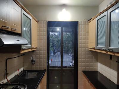 Kitchen Image of 900 Sq.ft 2 BHK Apartment / Flat for sale in Ekta Meadows, Borivali East Mumbai for Rs. 23500000