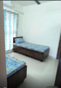 Bedroom Image of Balaji PG in Worli, Mumbai