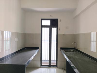 Kitchen Image of 790 Sq.ft 2 BHK Apartment / Flat for rent in Runwal My City Phase II Cluster 05 Part I, Usarghar Thane for Rs. 13999